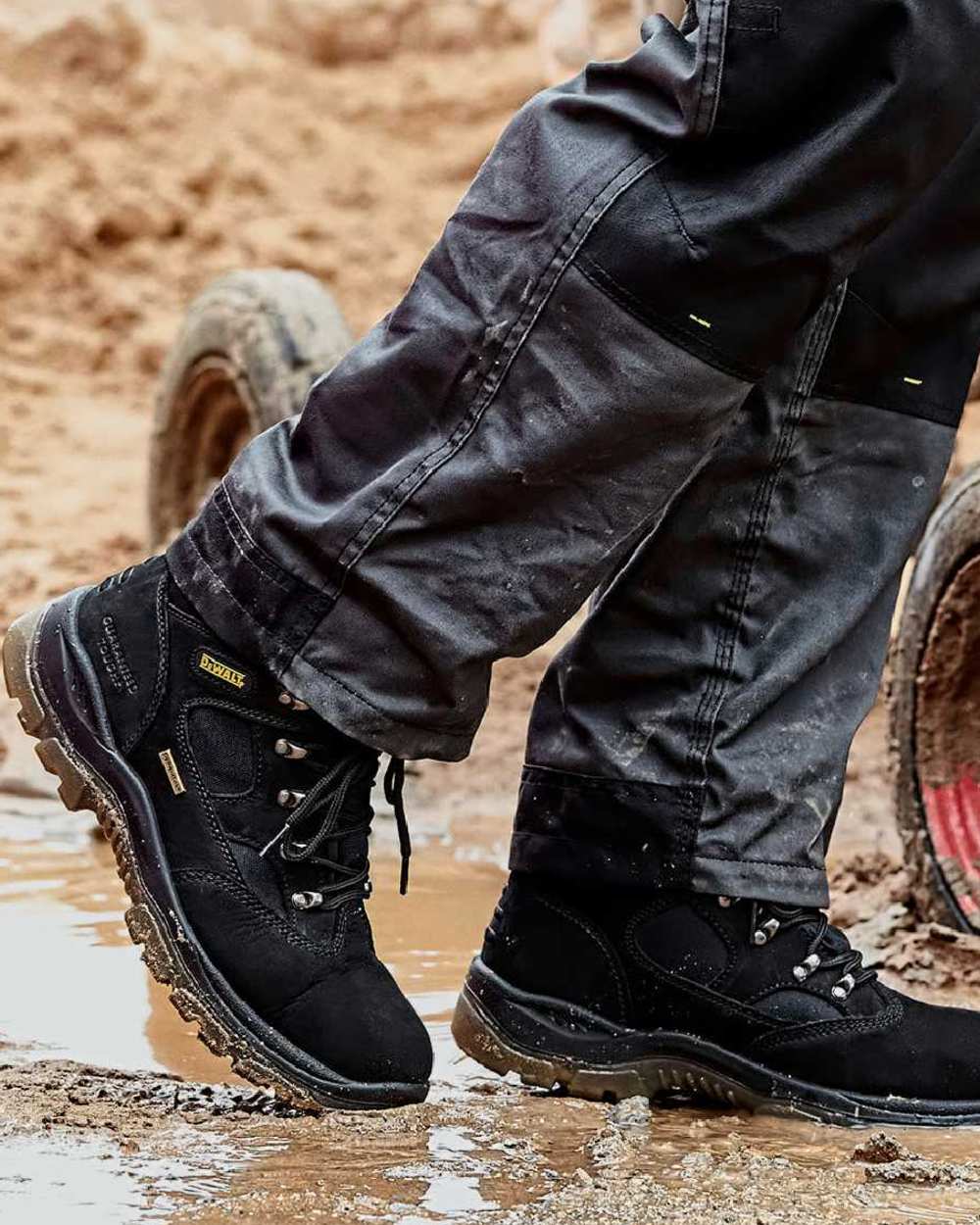 Black Coloured DeWalt Challenger Waterproof Safety Hiker Boots on outdoor background 