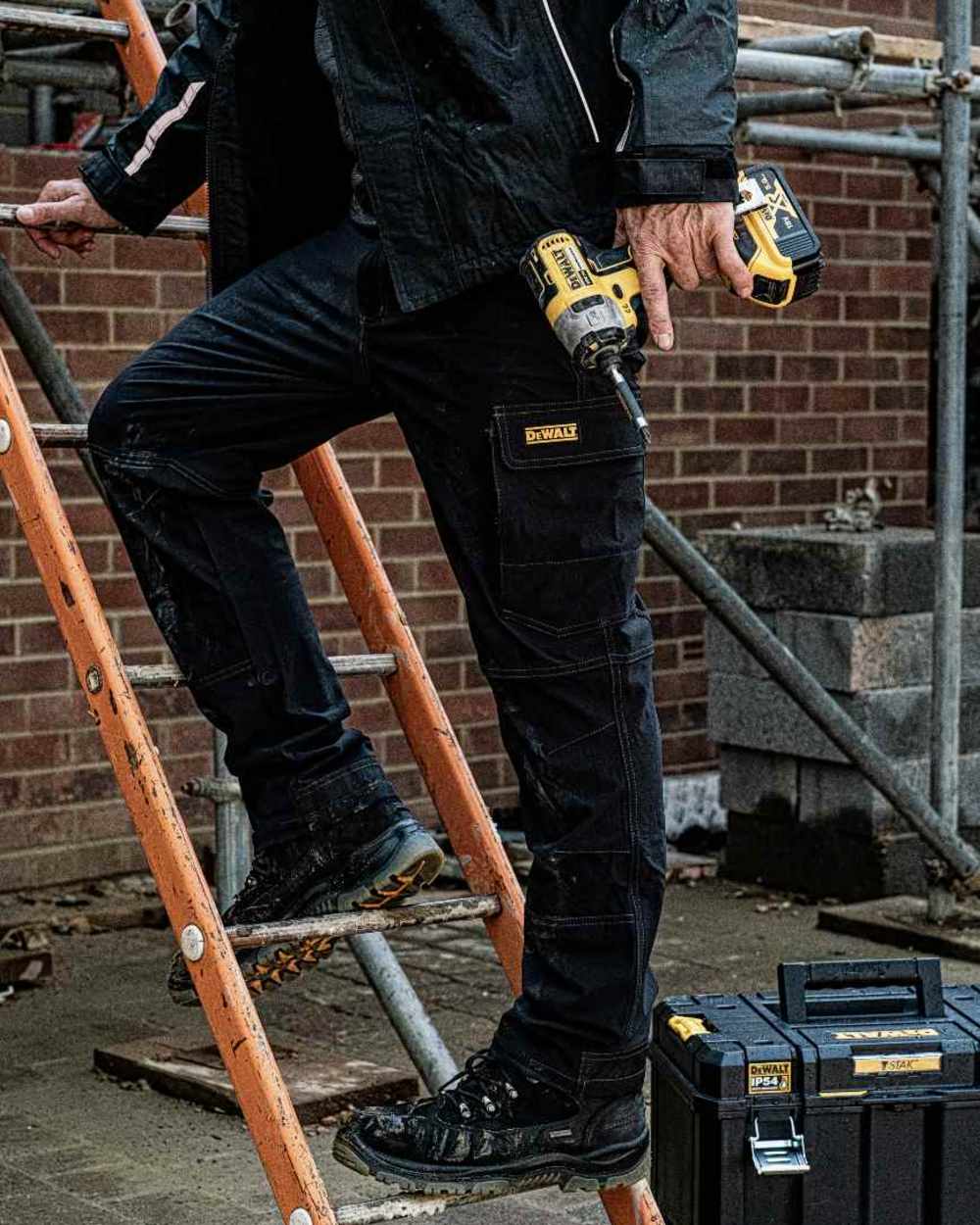 Black Coloured DeWalt Challenger Waterproof Safety Hiker Boots on outdoor background 