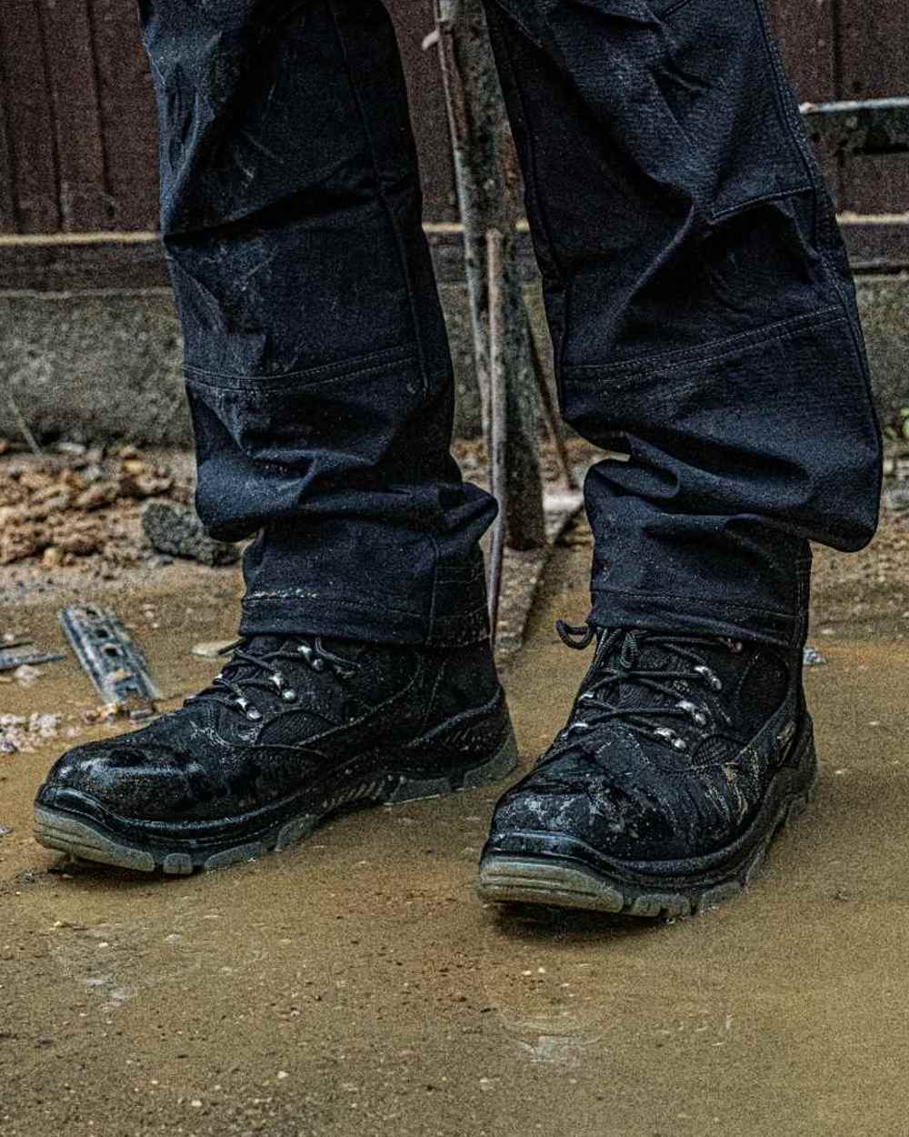 Black Coloured DeWalt Challenger Waterproof Safety Hiker Boots on outdoor background 