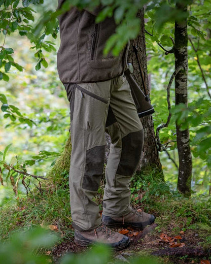 Capers Coloured Deerhunter Anti-Insect Trousers With HHL Treatment on forest background 