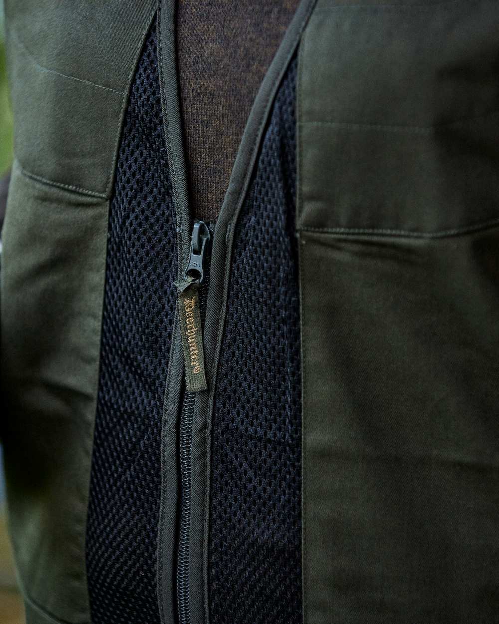 Timber coloured Deerhunter Atlas Mesh Shooting Waistcoat on blurry background 