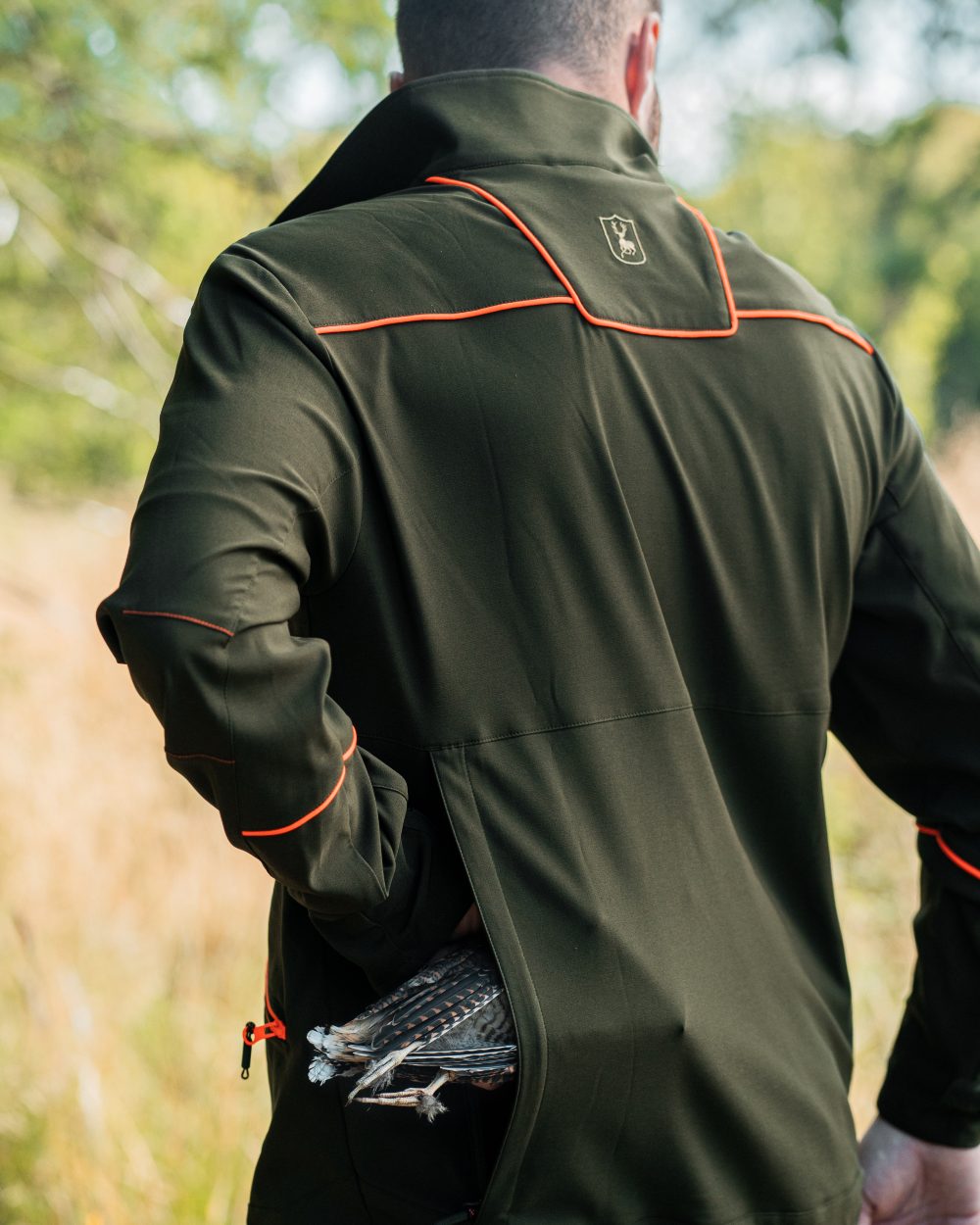 Forest Green coloured Deerhunter Chamois Jacket on forest background 