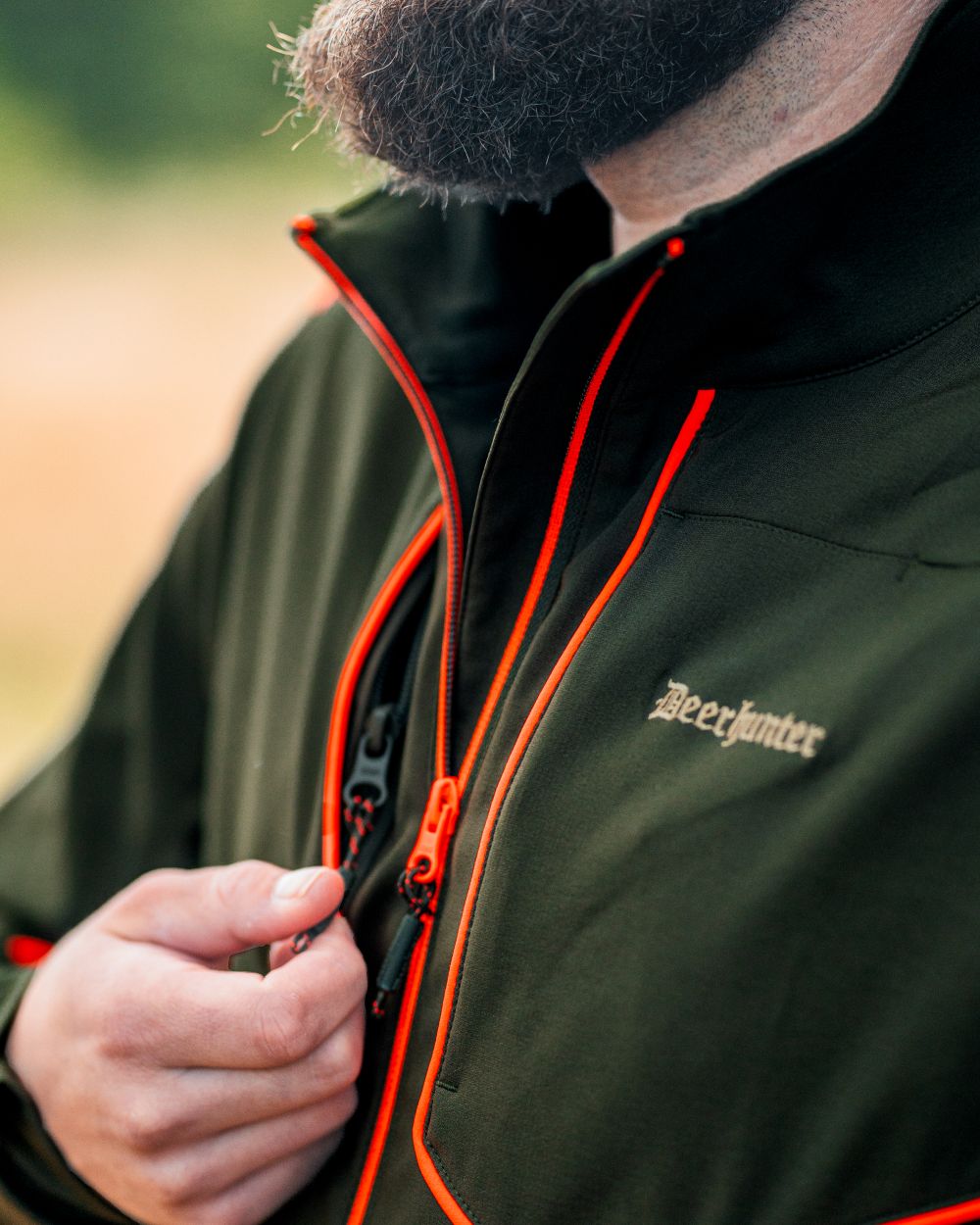 Forest Green coloured Deerhunter Chamois Jacket on forest background 