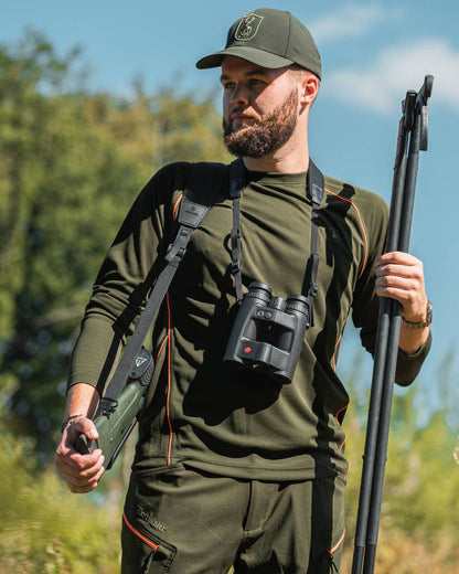 Forest Green Coloued Deerhunter Chamois Long Sleeve T-Shirt on forest background 