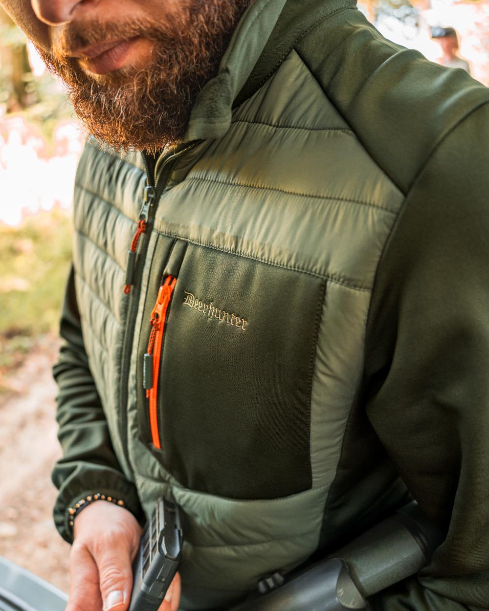 Forest Green coloured Deerhunter Chamois Padded Jacket on forest background 