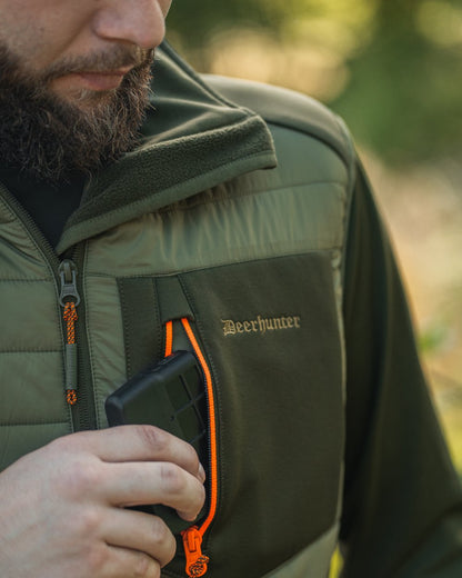 Forest Green coloured Deerhunter Chamois Padded Waistcoat on forest background 