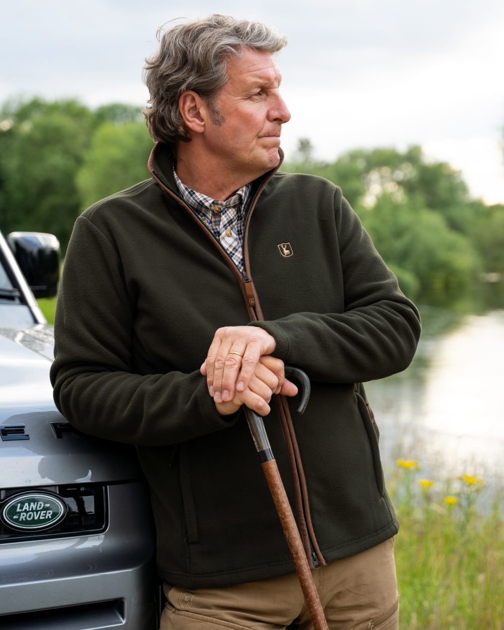 Forest Ember coloured Deerhunter Mens Cumbria Fleece Jacket on forest background 