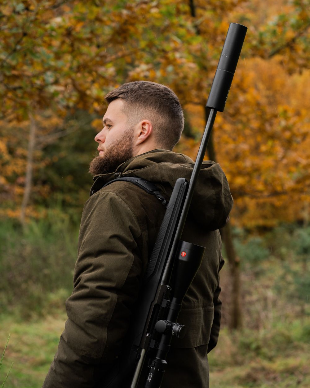 Tarmac Green Coloured Deerhunter Eagle Winter Jacket On A Forest Background 