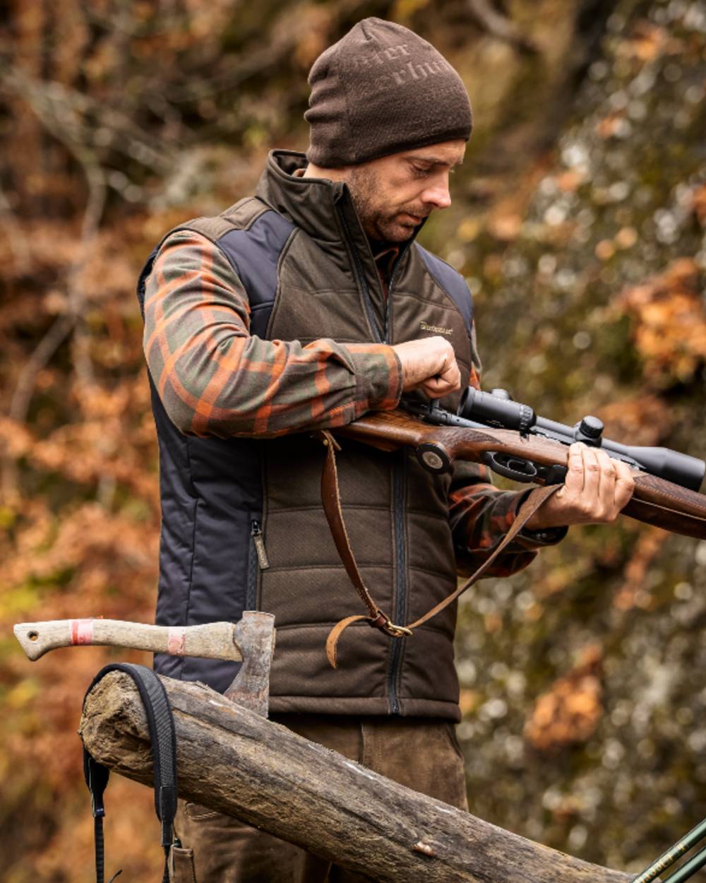 Walnut coloured Deerhunter Embossed Logo Beanie on forest background 