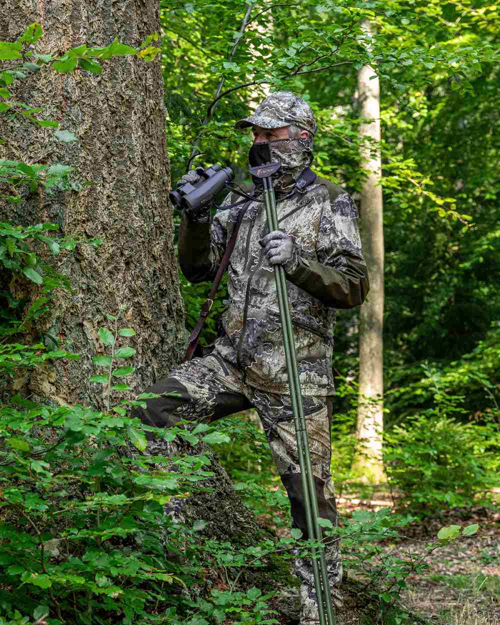 Realtree Excape coloured Deerhunter Excape Light Jacket on forest background 