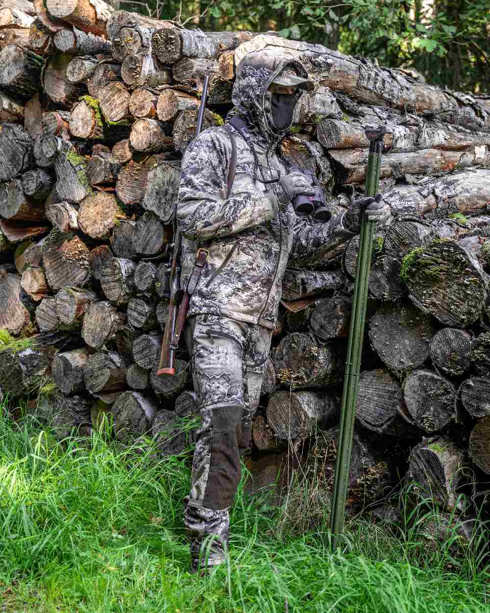 Realtree Excape coloured Deerhunter Excape Softshell Trousers on forest background 