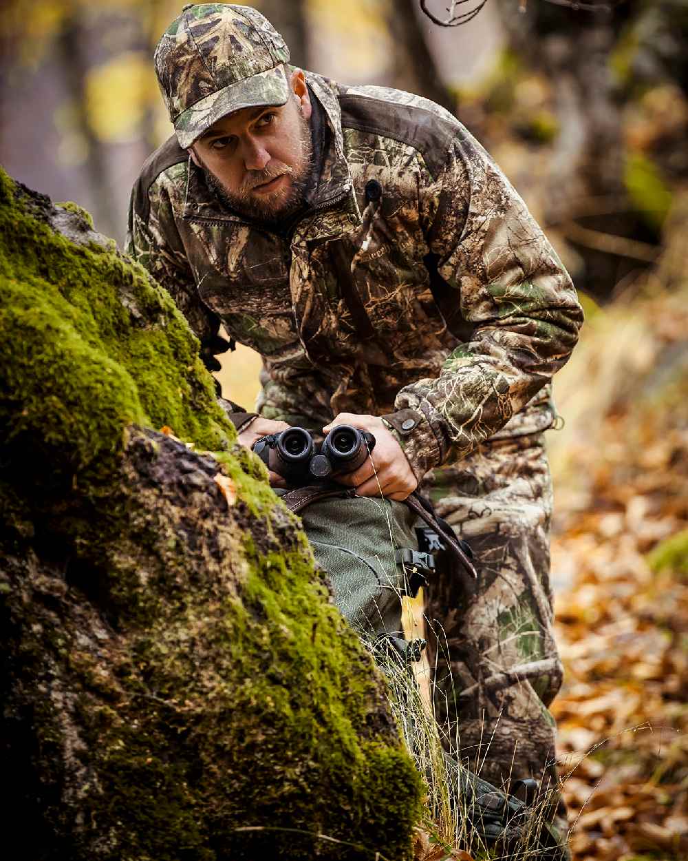 Realtree Adapt Coloured Deerhunter Explore Jacket on blurry background 