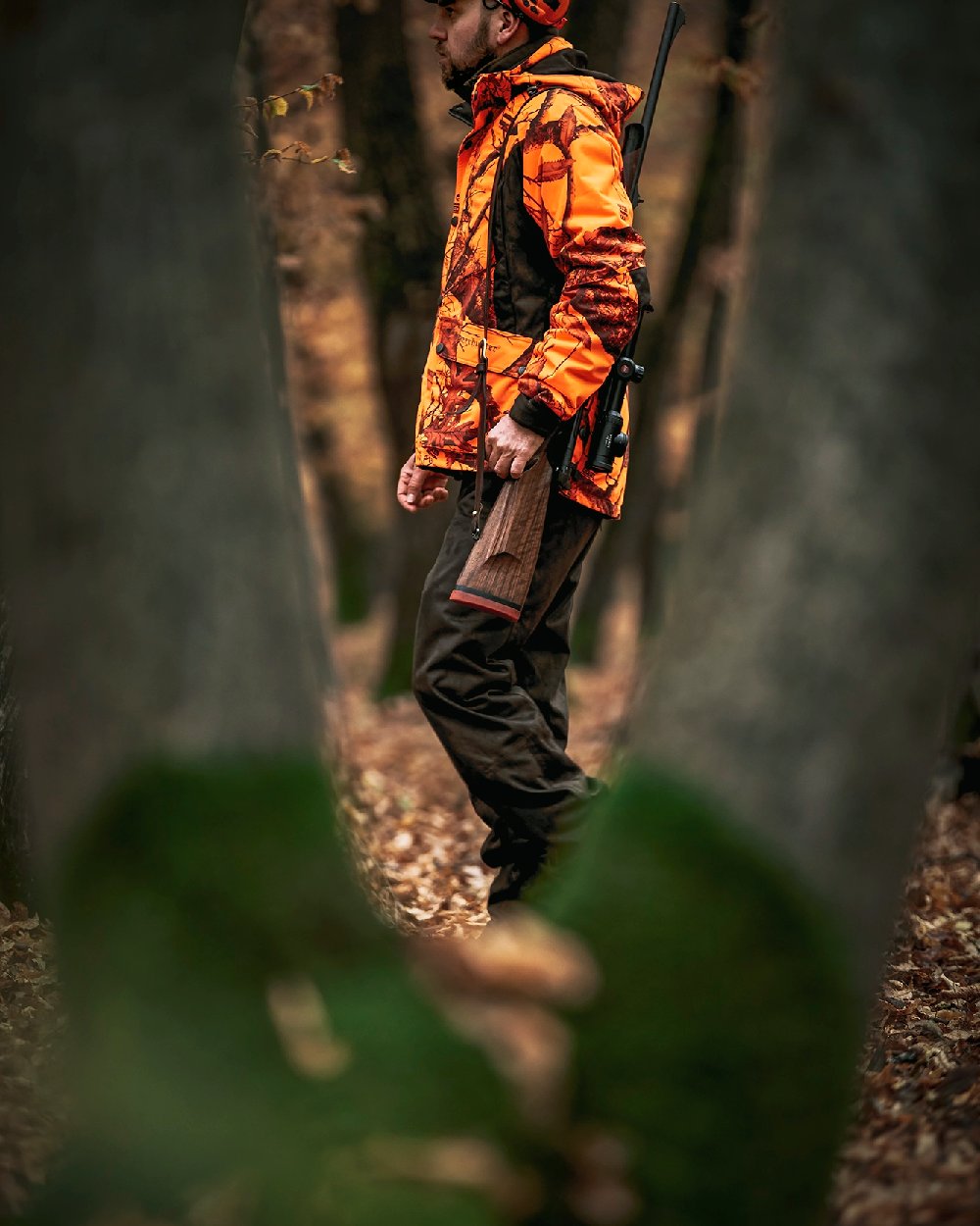 Realtree Edge Orange Coloured Deerhunter Explore Jacket on forest background 