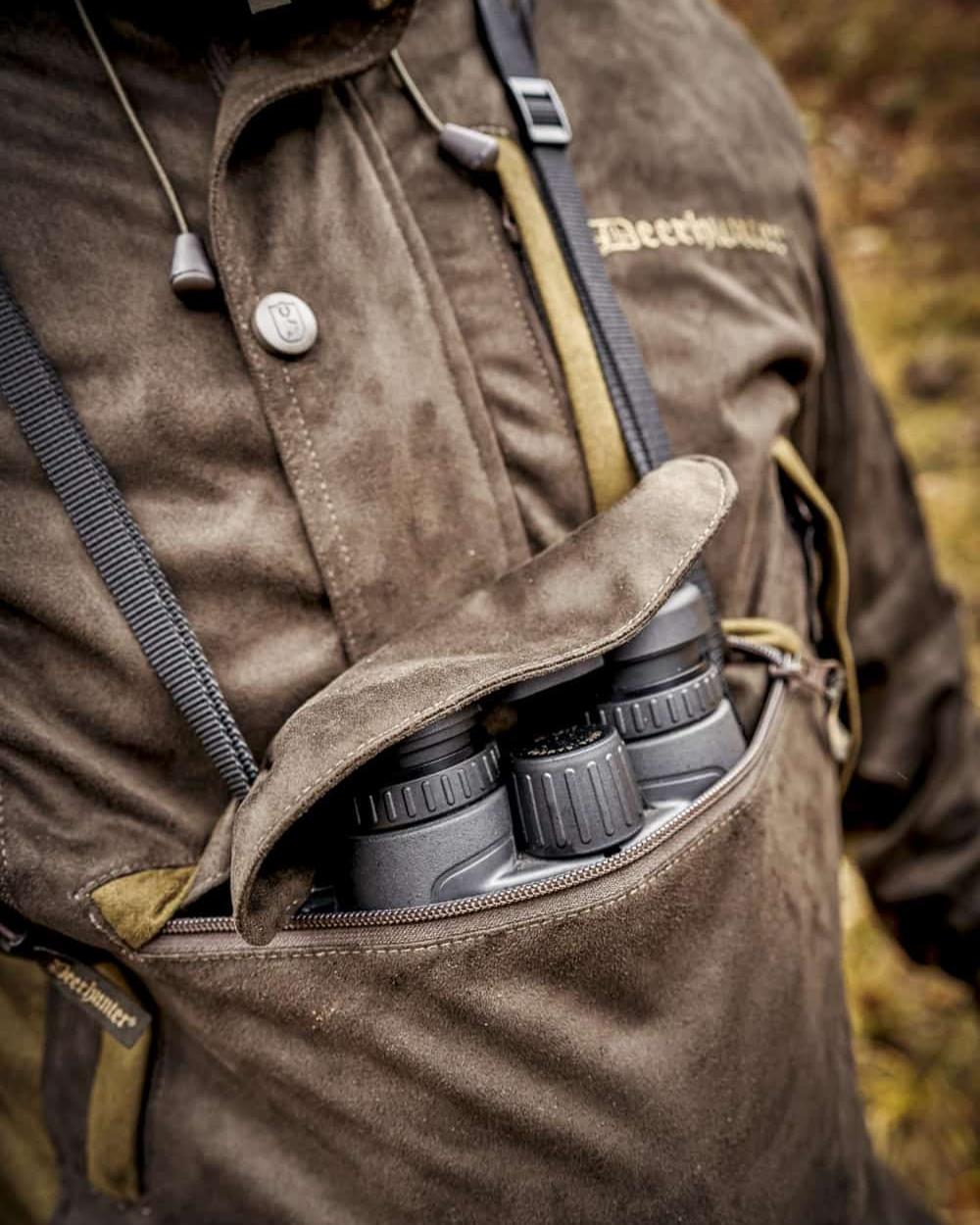 Walnut Coloured Deerhunter Explore Waterproof Smock on blurry background 