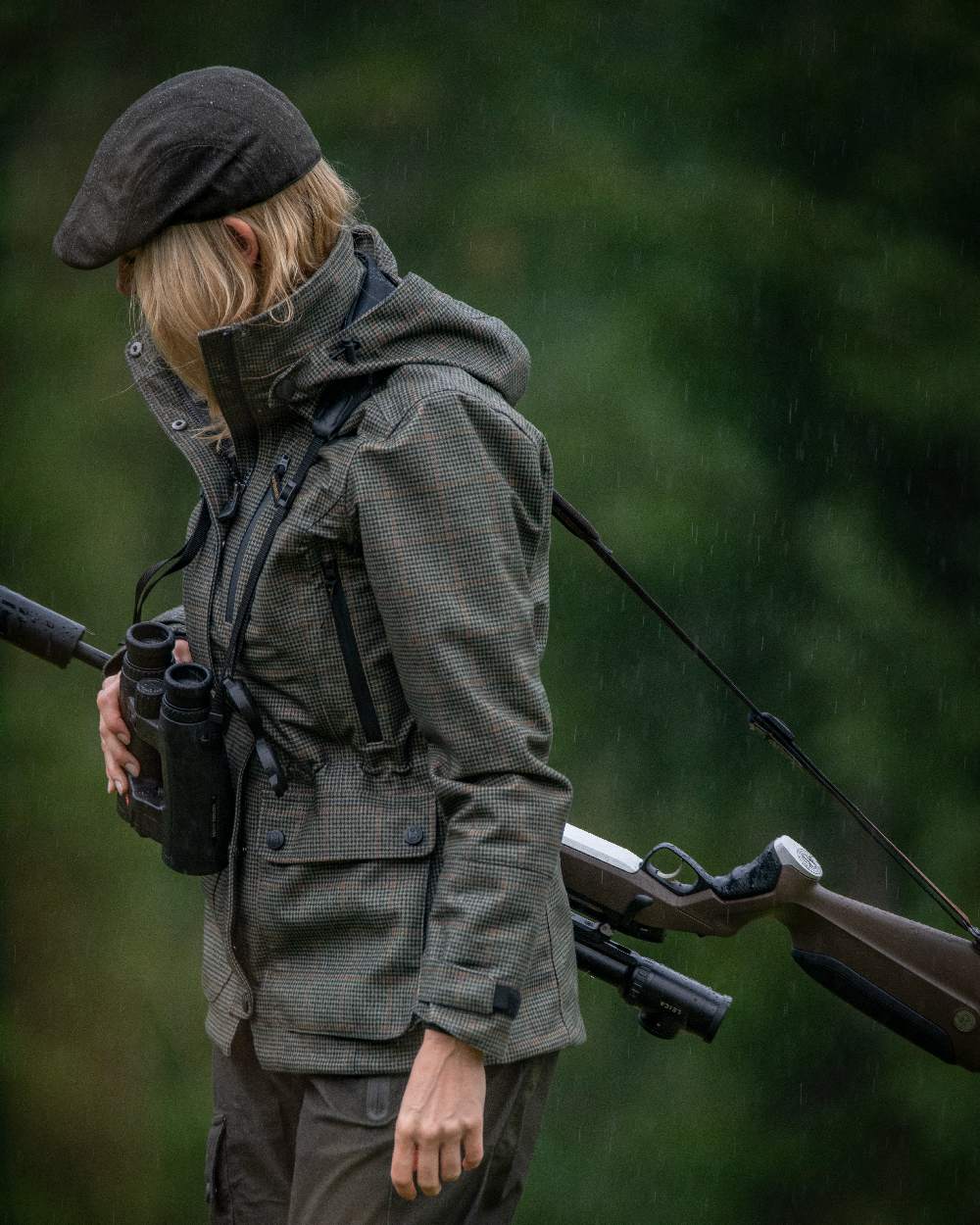 Elmwood coloured Deerhunter Flat Cap on blurry background 