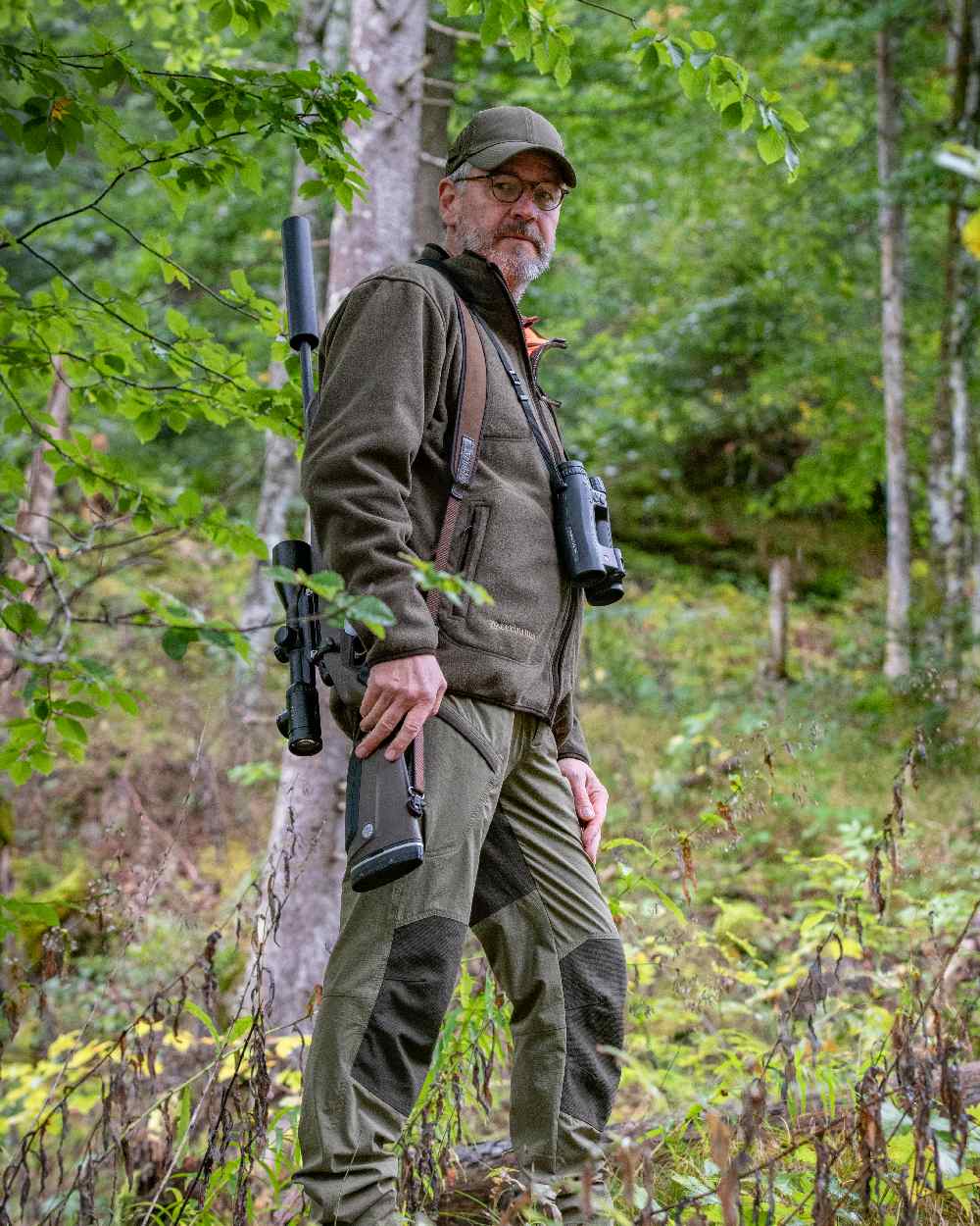 Canteen Orange coloured Deerhunter Gamekeeper Reversible Bonded Fleece Jacket on forest background 