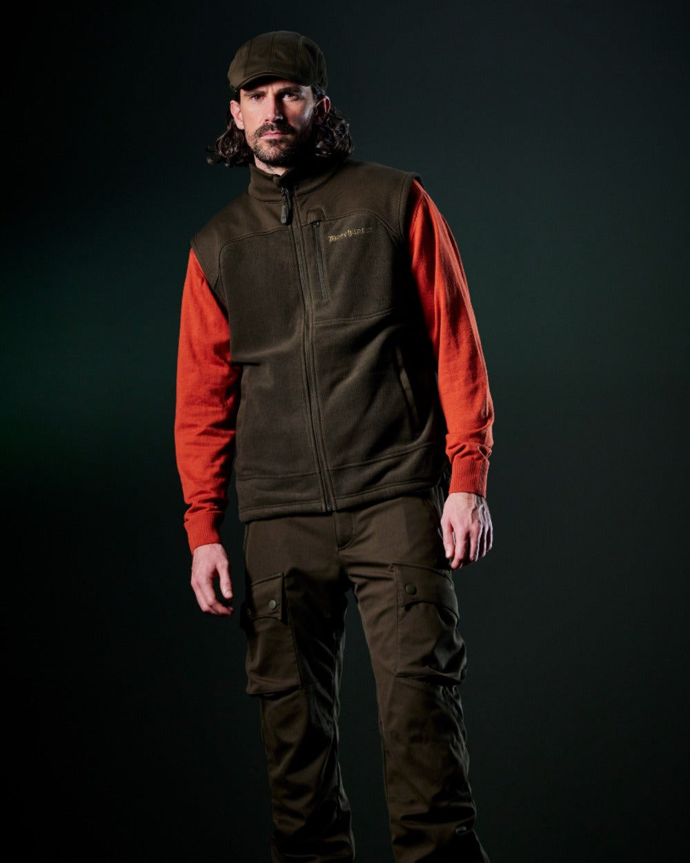 Oak Rust Melange coloured Deerhunter Mens Harrington V-Neck Knit Pullover on dark background 