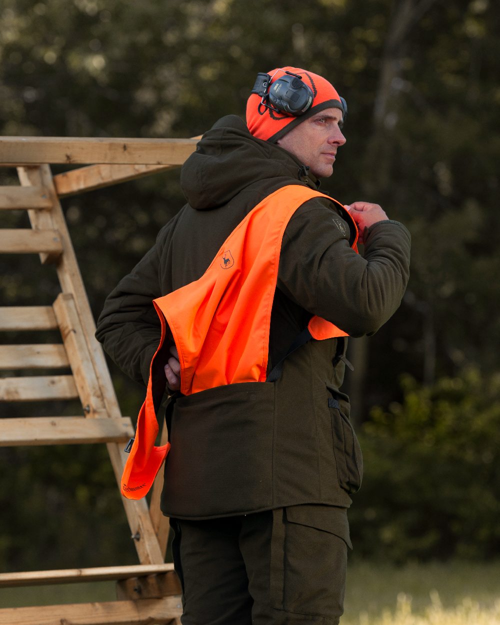 Wood coloured Deerhunter Heat Game Trousers on blurry background 