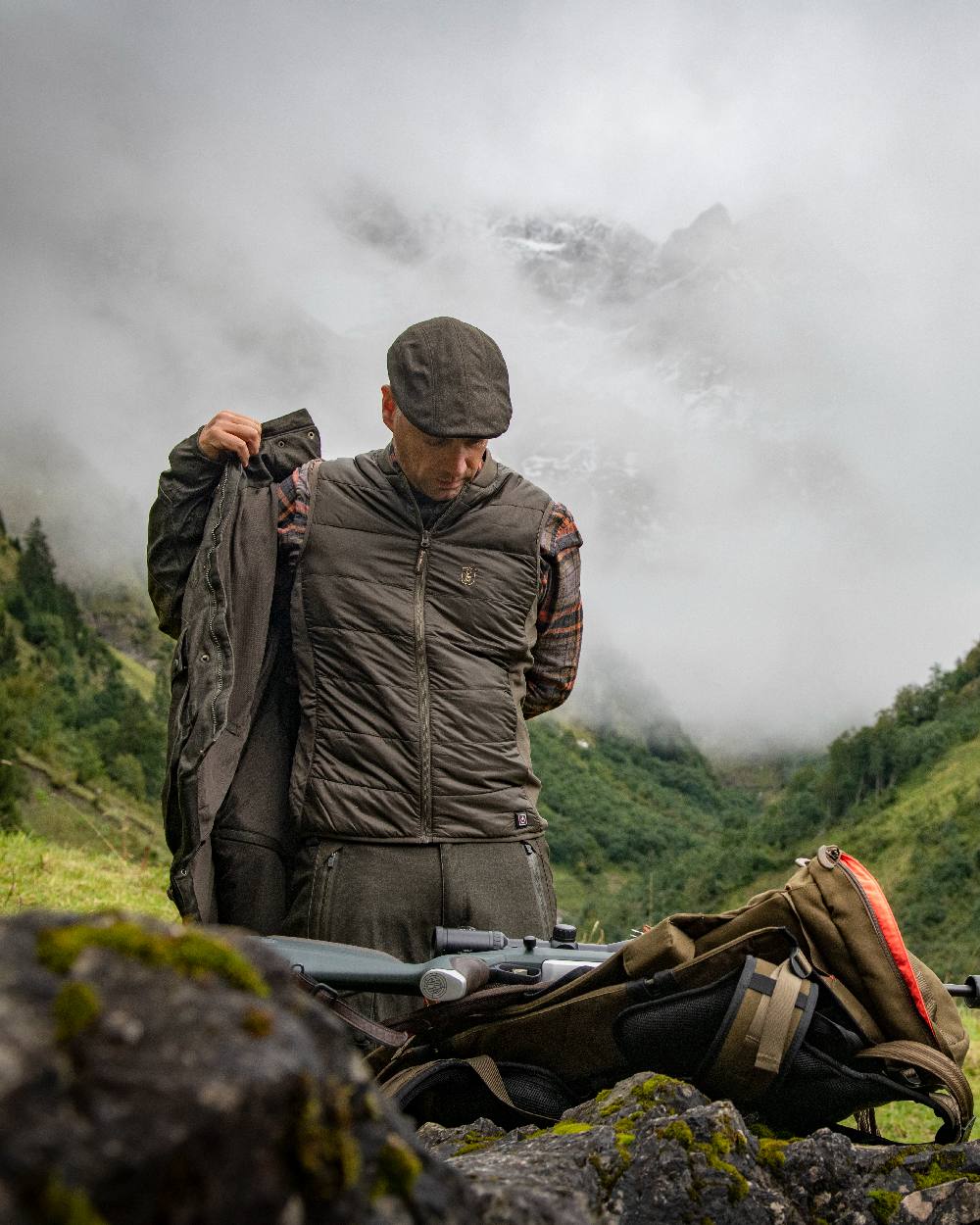 Deep Green Coloured Deerhunter Heat Inner Waistcoat on mountain background 