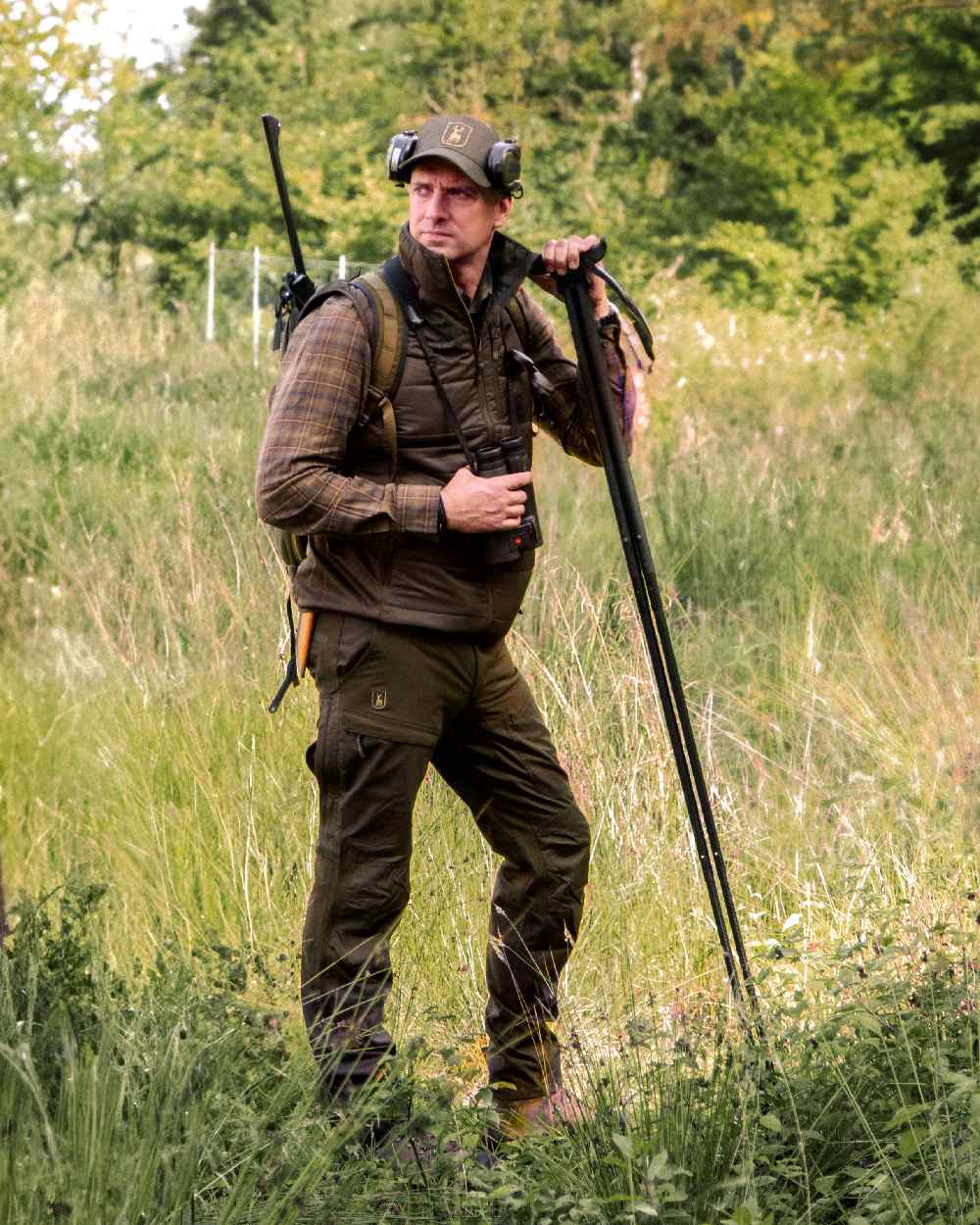 Wood Coloured Deerhunter Heat Padded Waistcoat on forest background 