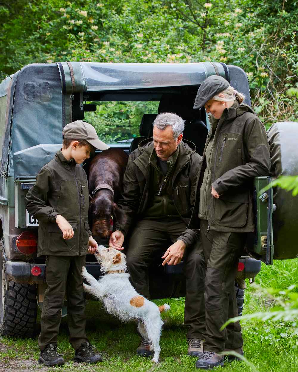 Olive Night Melange coloured Deerhunter Lady Chasse Trousers on jeep background 