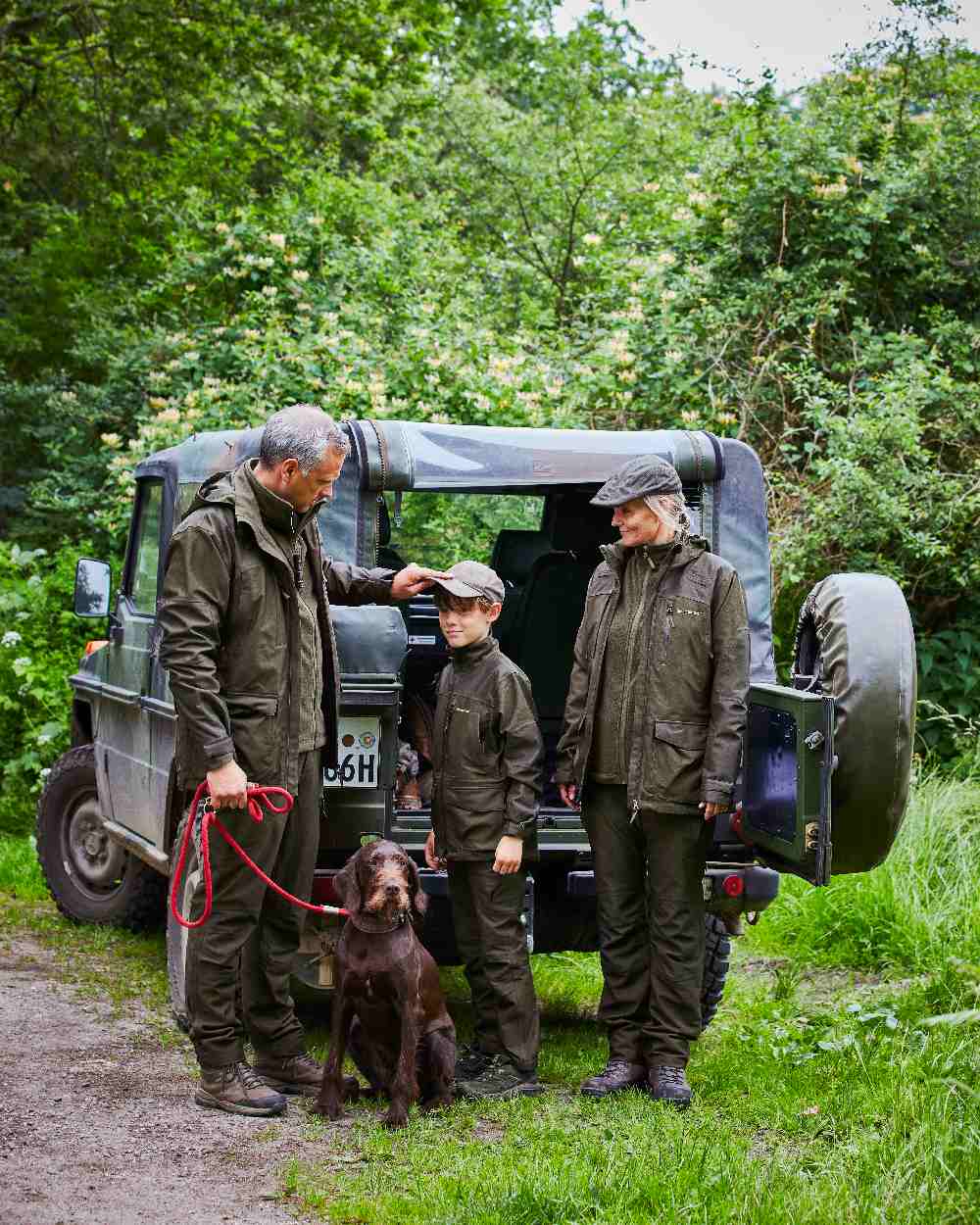 Olive Night Melange coloured Deerhunter Lady Chasse Trousers on jeep background 