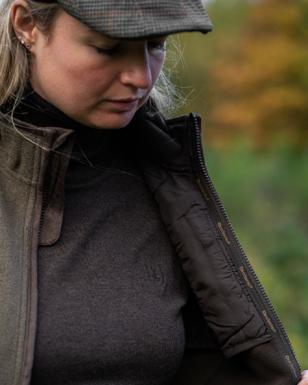 Dark Elm coloured Deerhunter Lady Darlington Roll Neck on blurry background 