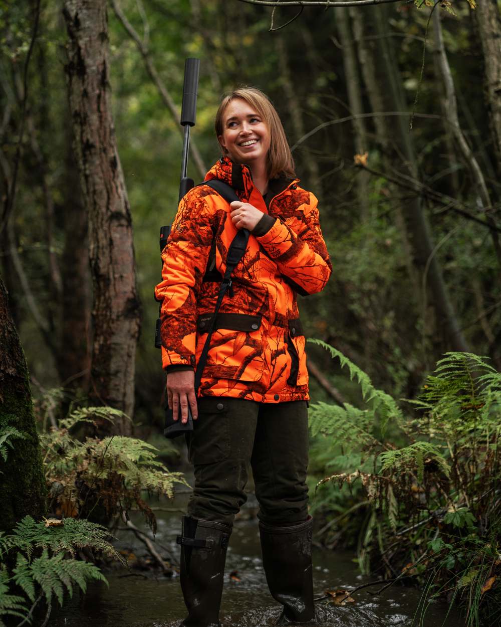 Realtree Edge Orange coloured Deerhunter Lady Eagle Winter Jacket  on forest background 