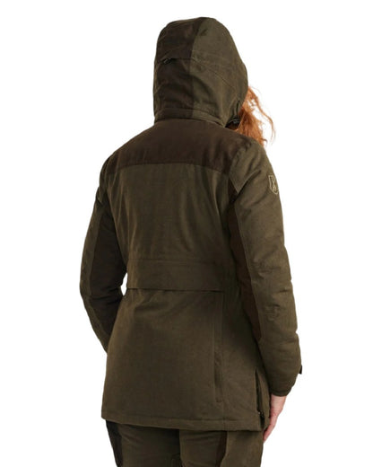 Tarmac Green coloured Deerhunter Lady Eagle Winter Jacket on blurry background 