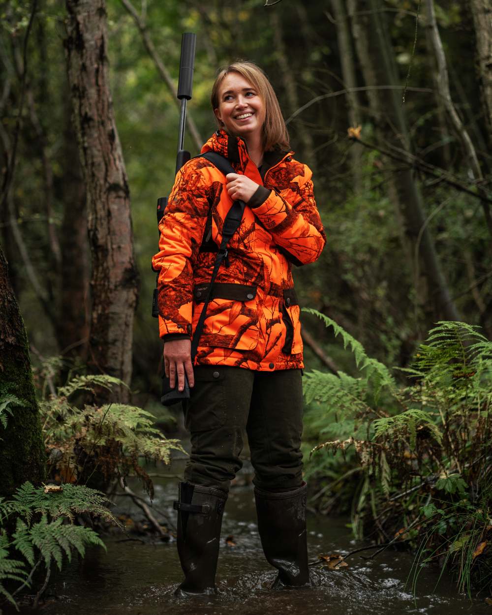 Tarmac Green coloured Deerhunter Lady Eagle Winter Trousers on forest background 