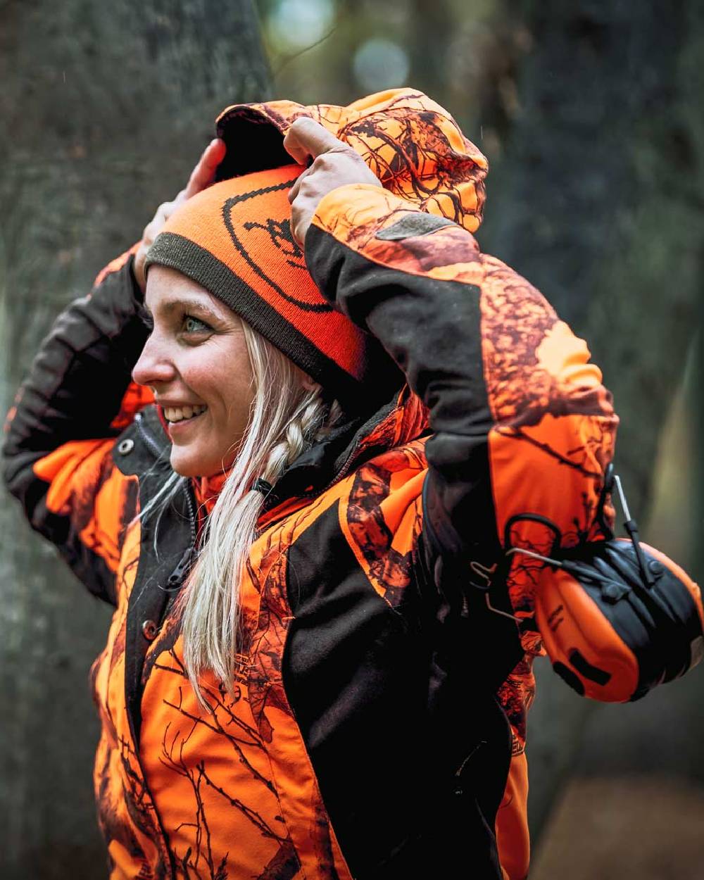 Realtree Edge Orange Coloured Deerhunter Lady Estelle Jacket on forest background 