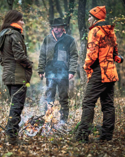 Realtree Edge Orange Coloured Deerhunter Lady Estelle Winter Jacket on forest background 