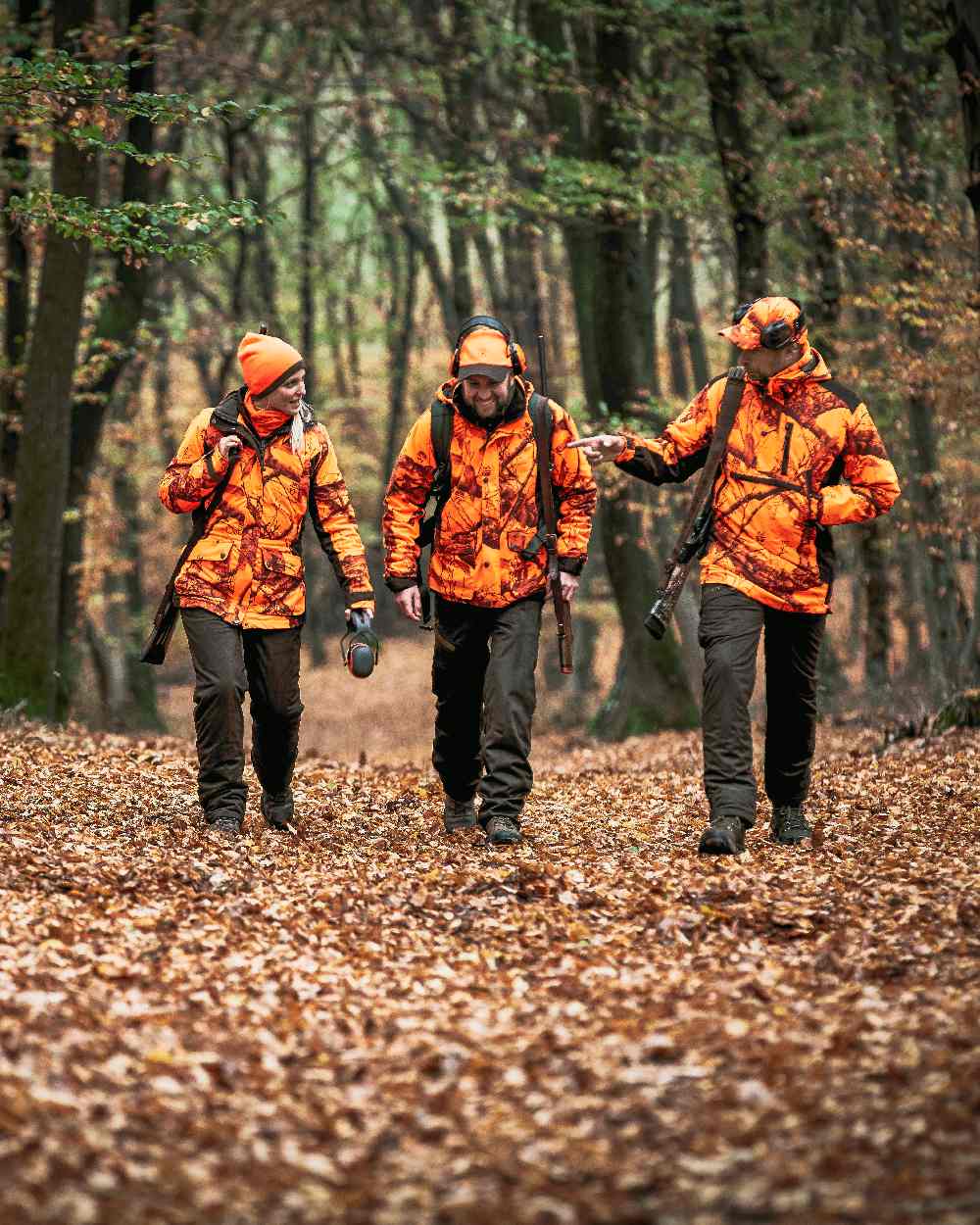 Realtree Edge Orange Coloured Deerhunter Lady Estelle Winter Jacket on forest background 