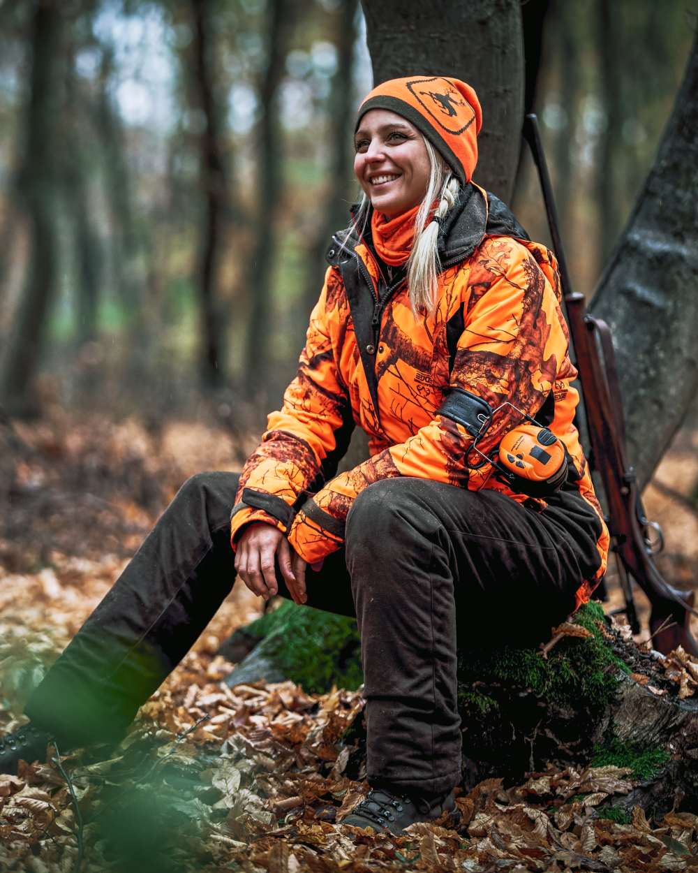 Realtree Edge Orange Coloured Deerhunter Lady Estelle Winter Jacket on forest background 