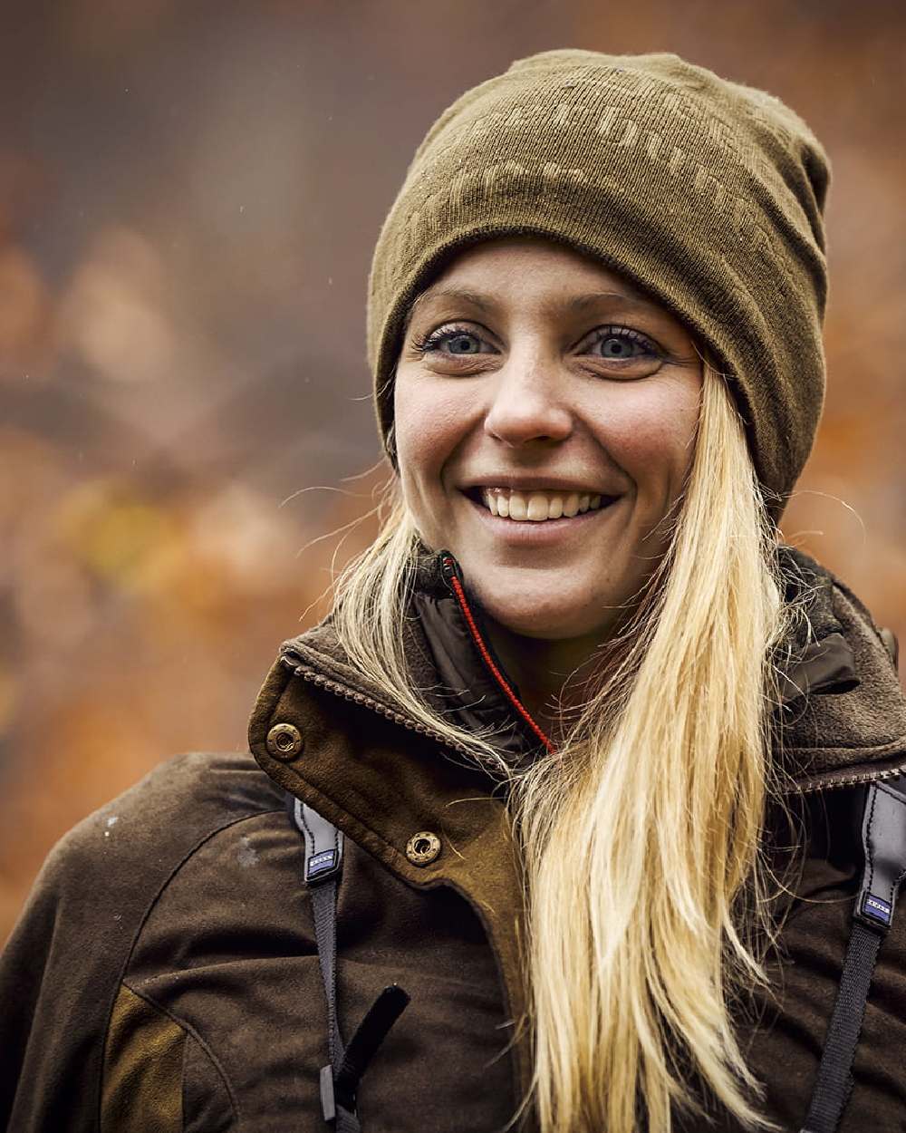 Walnut Coloured Deerhunter Lady Estelle Winter Jacket on blurry background 