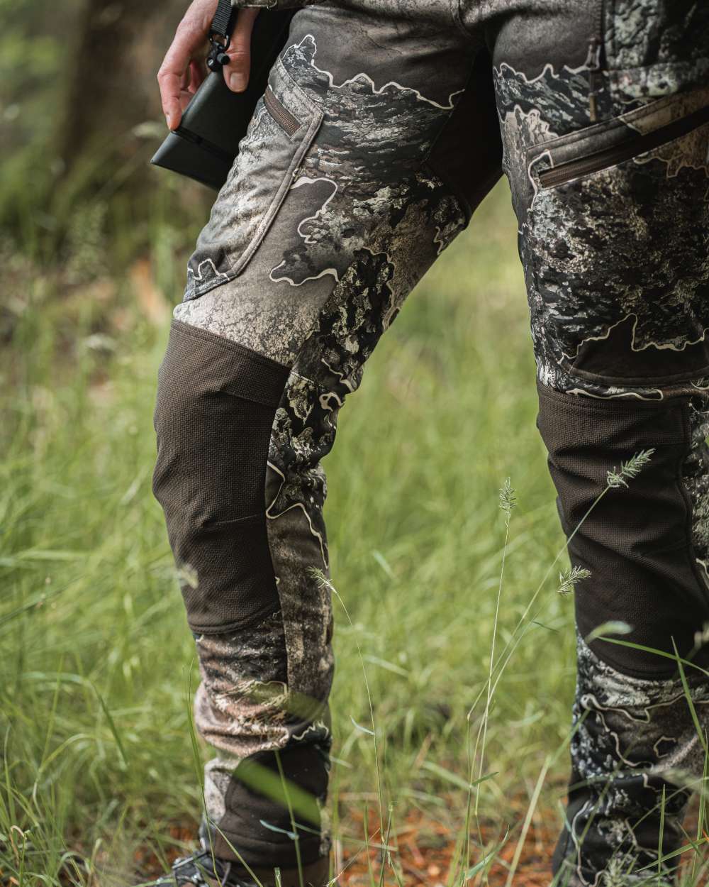 Realtree Excape coloured Deerhunter Lady Excape Softshell Trousers on forest background 