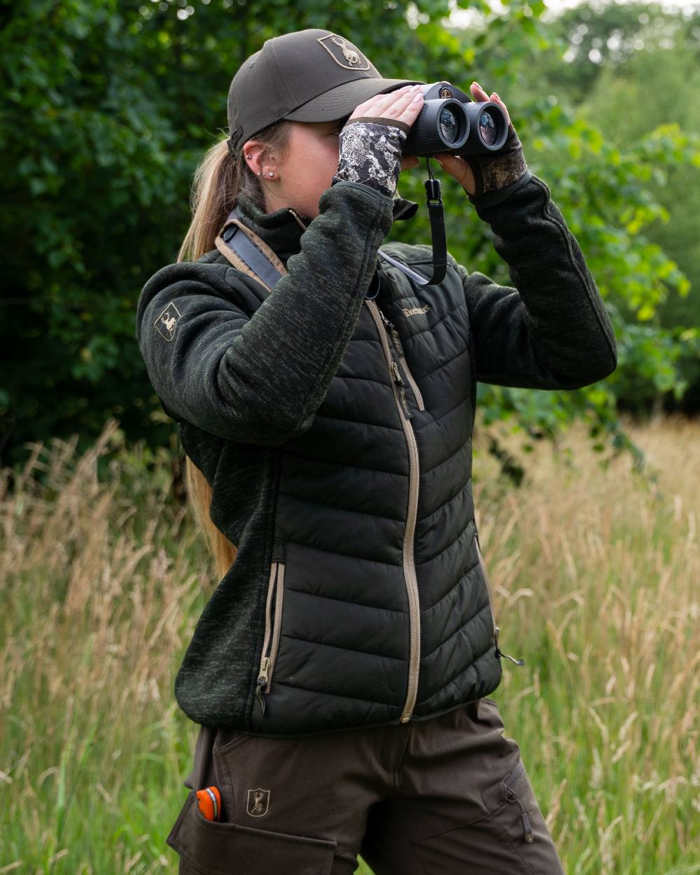 Forest Ember coloured Deerhunter Lady Moor Padded Jacket on forest background 