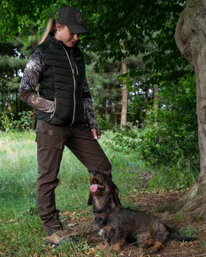 Forest Ember coloured Deerhunter Lady Moor Padded Jacket on forest background 