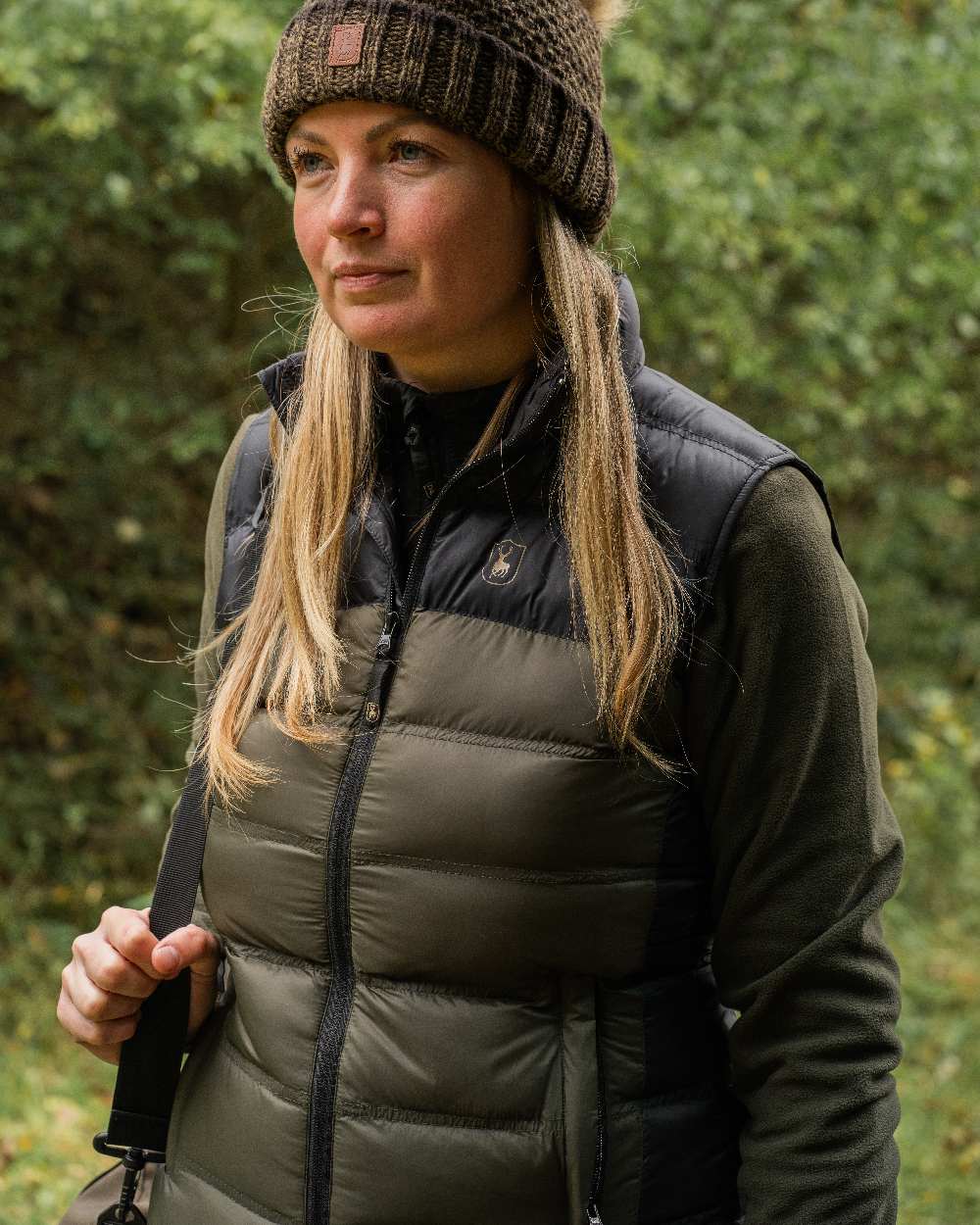 Rifle Green coloured Deerhunter Lady Northward Padded Waistcoat on blurry background 