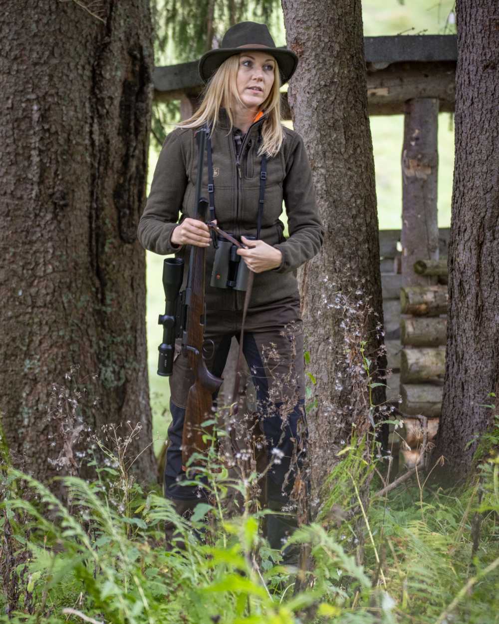 Green Orange coloured Deerhunter Lady Pam Reversible Bonded Fleece Jacket on forest background 