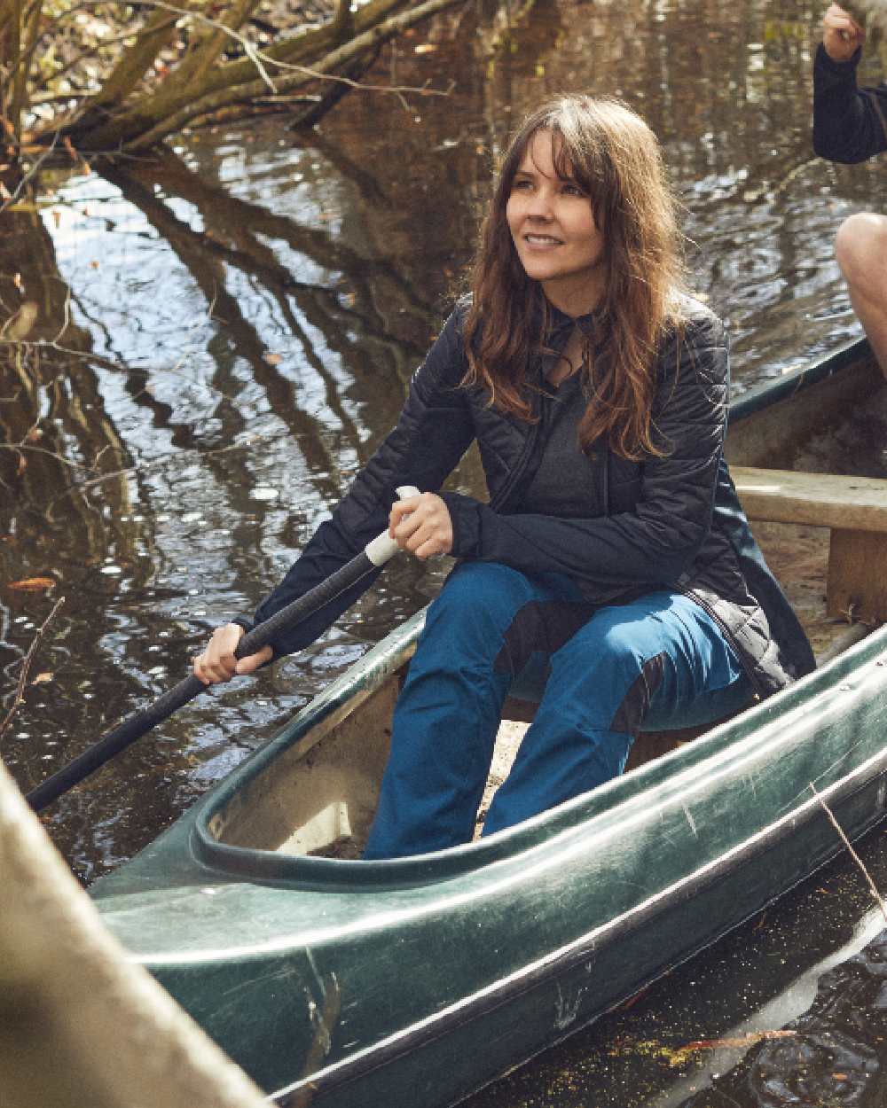 Black coloured Deerhunter Lady Pine Padded Inner Jacket on lake background 