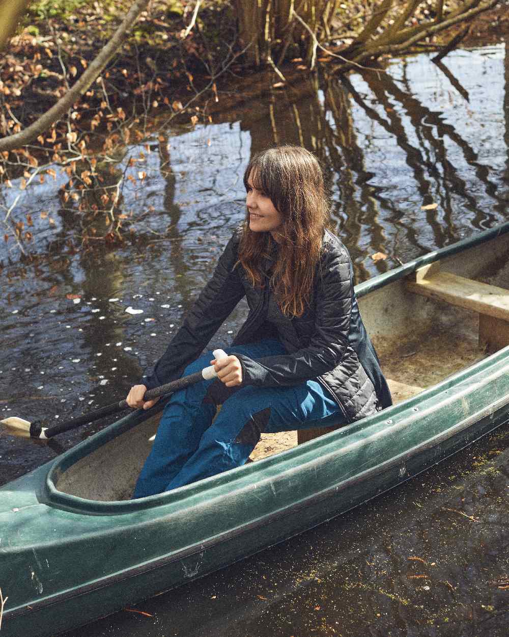 Black coloured Deerhunter Lady Pine Padded Inner Jacket on lake background 