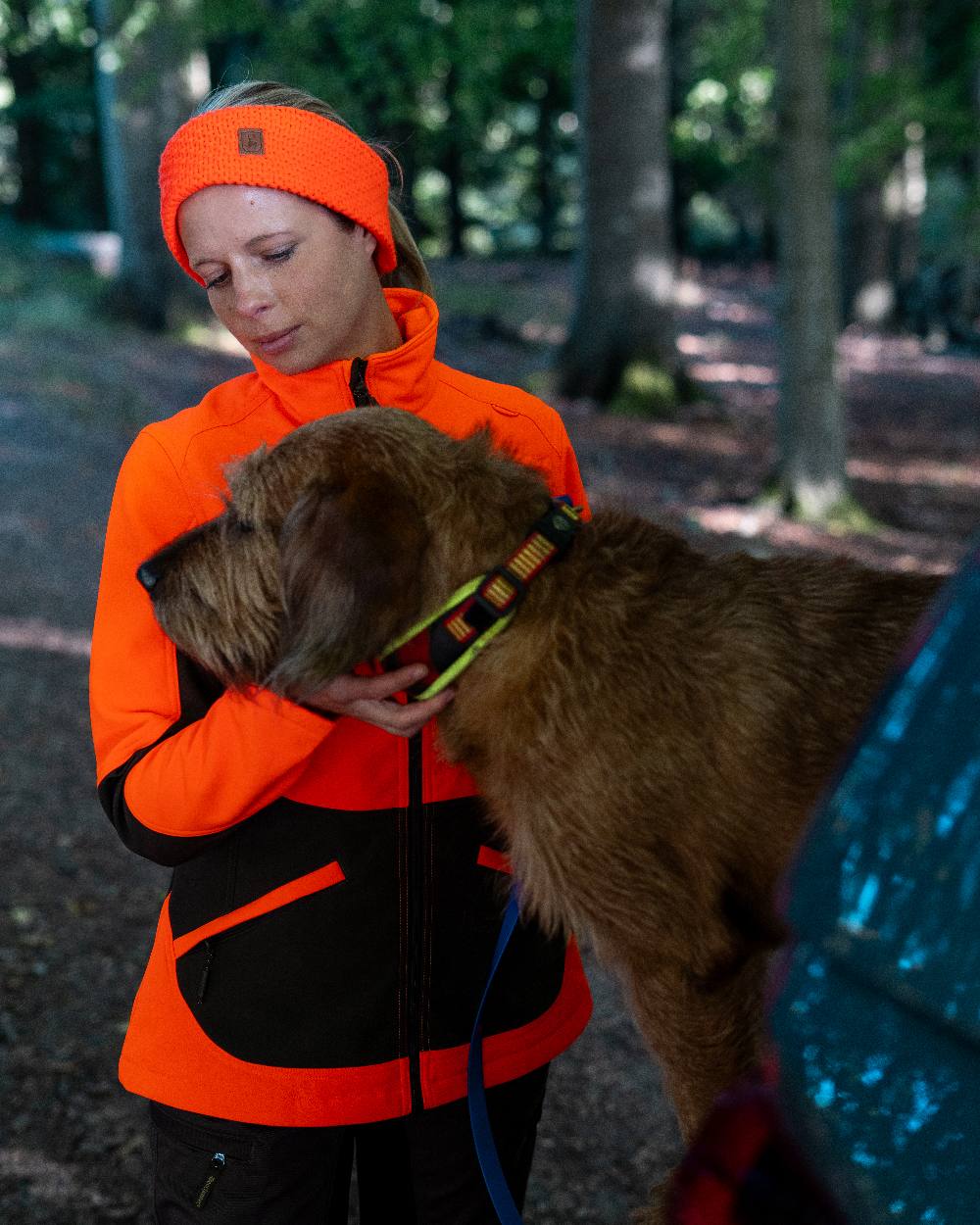 Safety Orange Coloured Deerhunter Lady Rogaland Softshell Jacket On Forest Background 