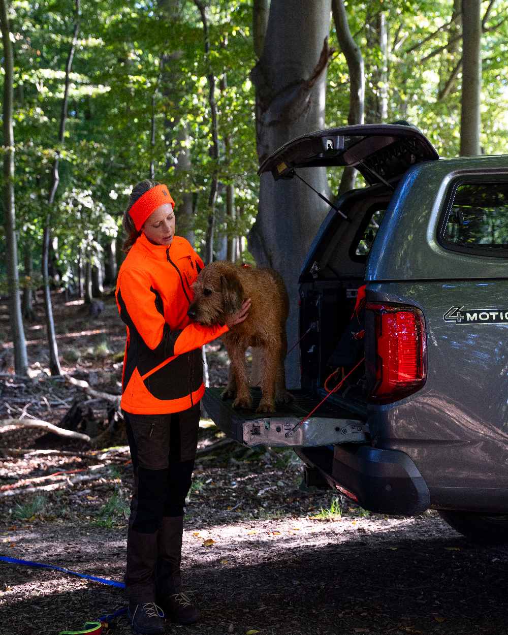 Safety Orange Coloured Deerhunter Lady Rogaland Softshell Jacket On Forest Background 