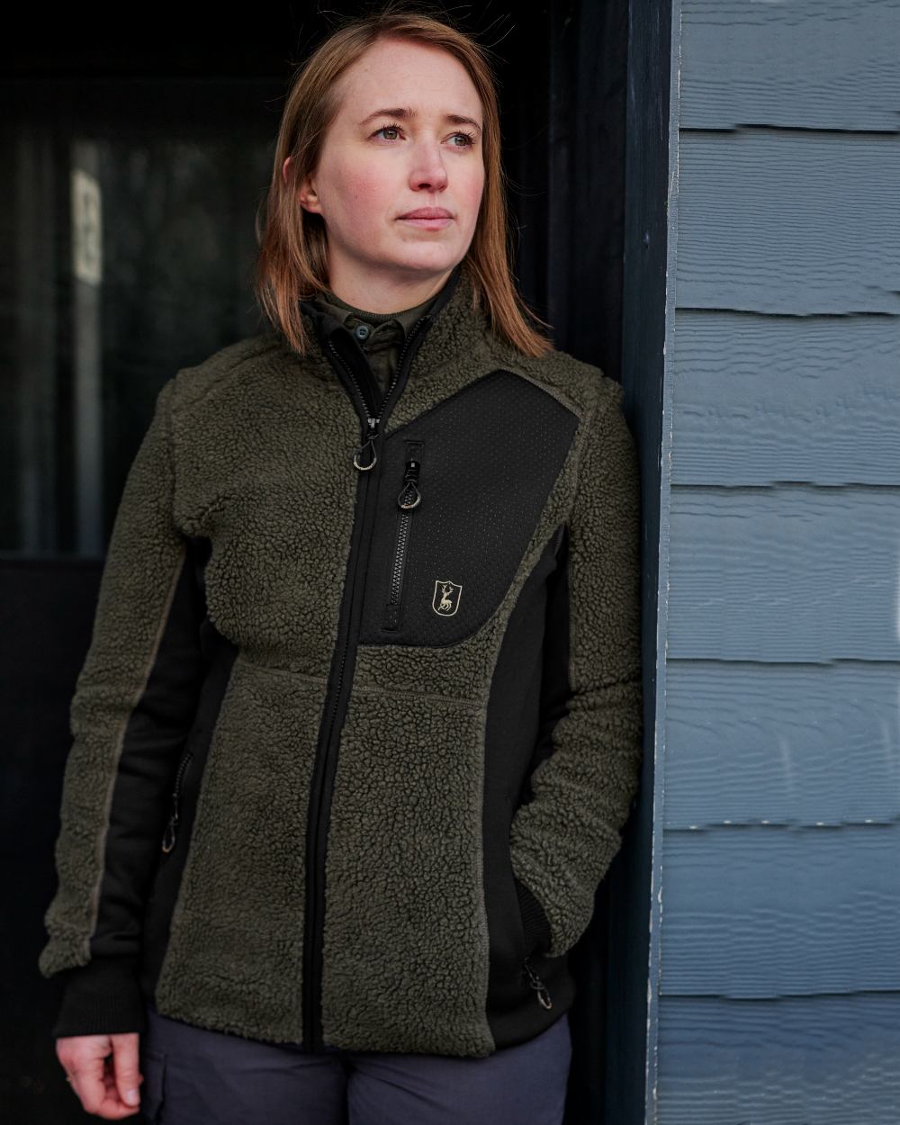 Adventure Green Coloured Deerhunter Lady Roja Fiber Pile Jacket On A Wall Background 