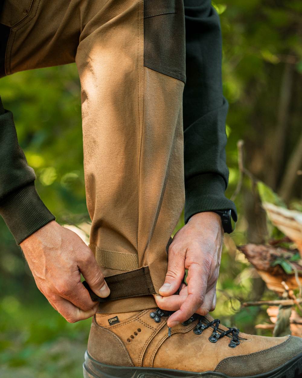 Butternut Fallen Leaf coloured Deerhunter Lady Sarek Full Stretch Trousers on forest background 