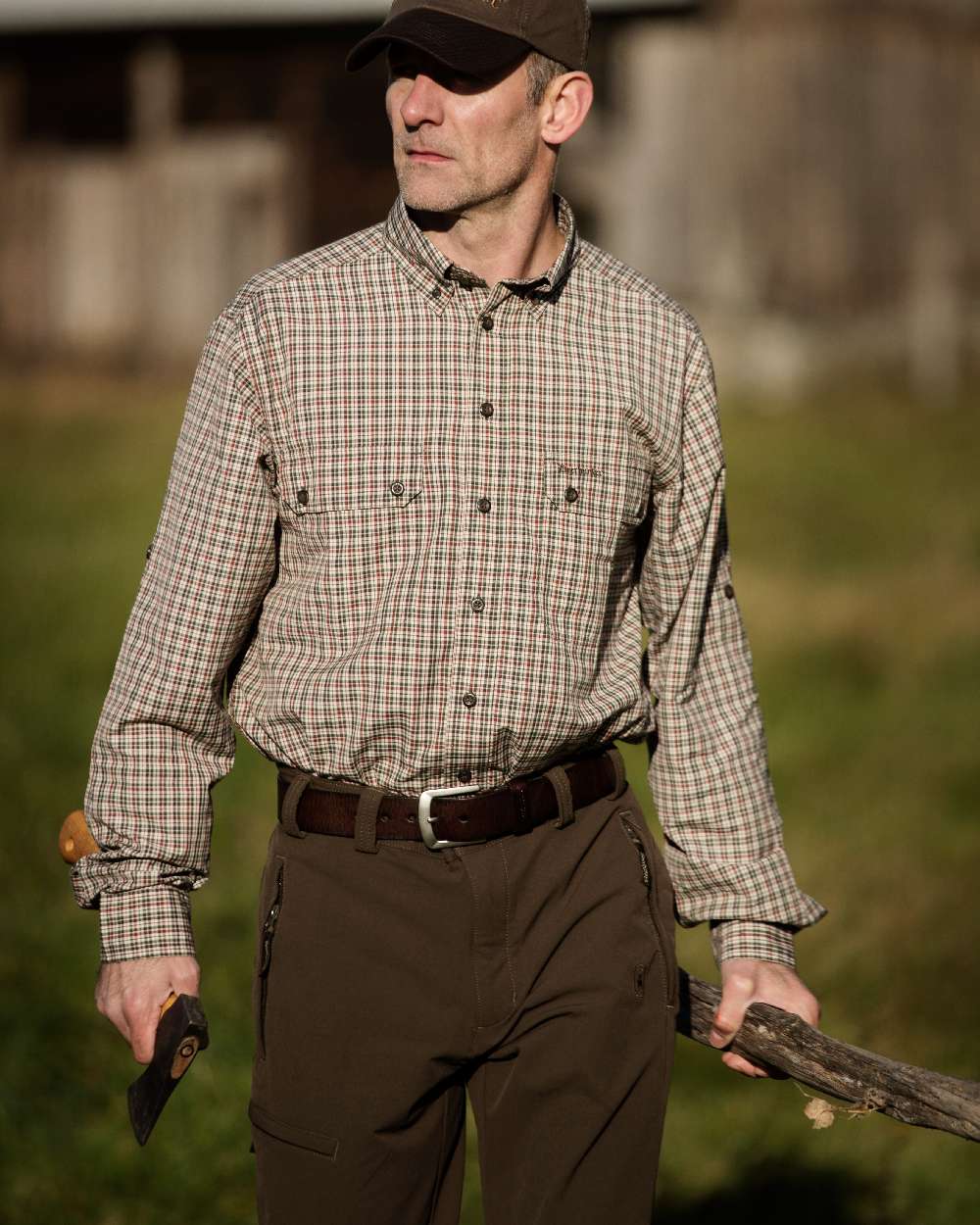 Dark Brown coloured Deerhunter Leather Belt on blurry background 