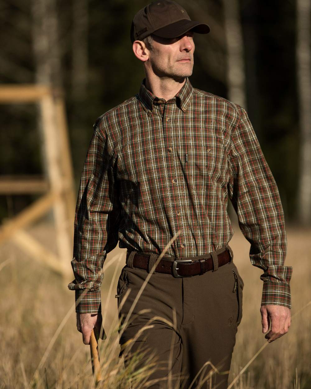 Dark Brown coloured Deerhunter Leather Belt on blurry background 