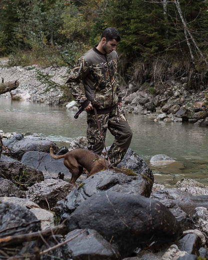 Realtree Max-5 coloured Deerhunter Mallard Trousers on lake background 