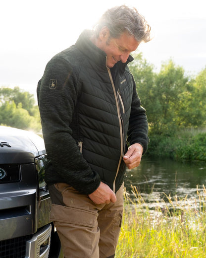 Forest Ember coloured Deerhunter Mens Moor Padded Jacket on forest background 